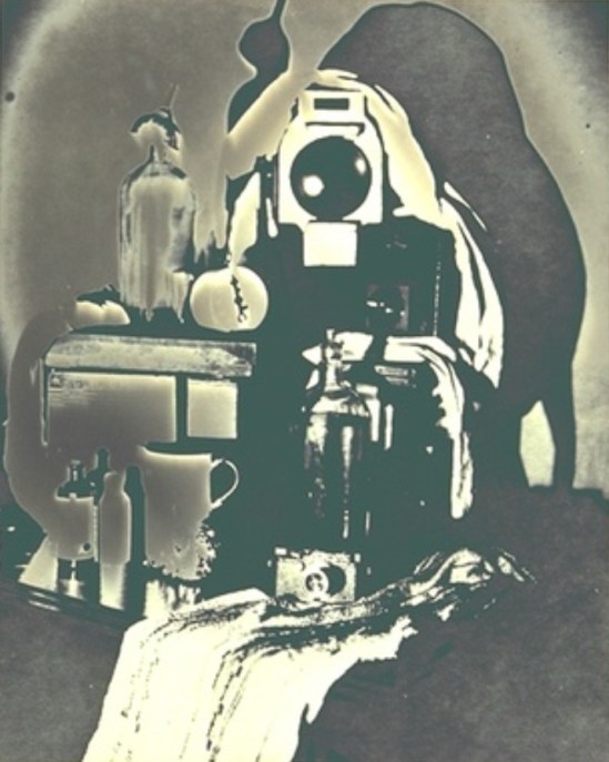 Francis Bruguiere.  Solarized still life with Leica model III  1933-1940 Via geh.org