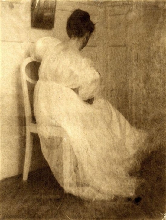 Heinrich Kühn. Miss Mary seated on a white chair 1910 Via mutualart
