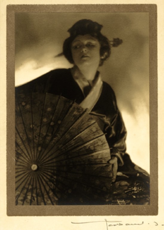 Portrait of a Japanese woman. (Possibly a French woman dressed in Japanese robes). Early 20th century