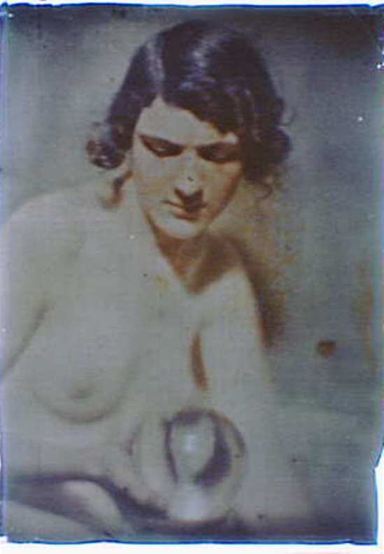 Arnold Genthe . Nude study of a woman holding a glass ball. Autochrome. Via loc.gov