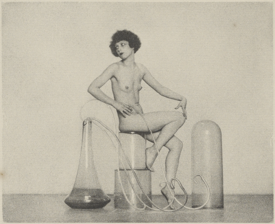 [Female Nude Posed With Glass Jars]