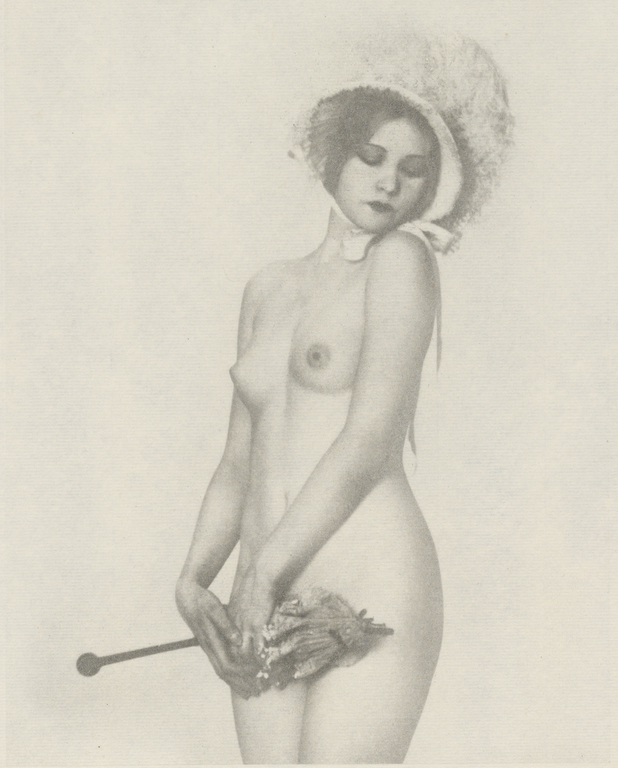 Arthur F. Kales. Female Nude Wearing Bonnet and Holding a Parasol]. Via getty