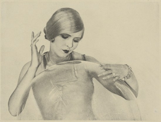 Arthur F. Kales. Woman Touching Large Glass Ball 1920. Via getty