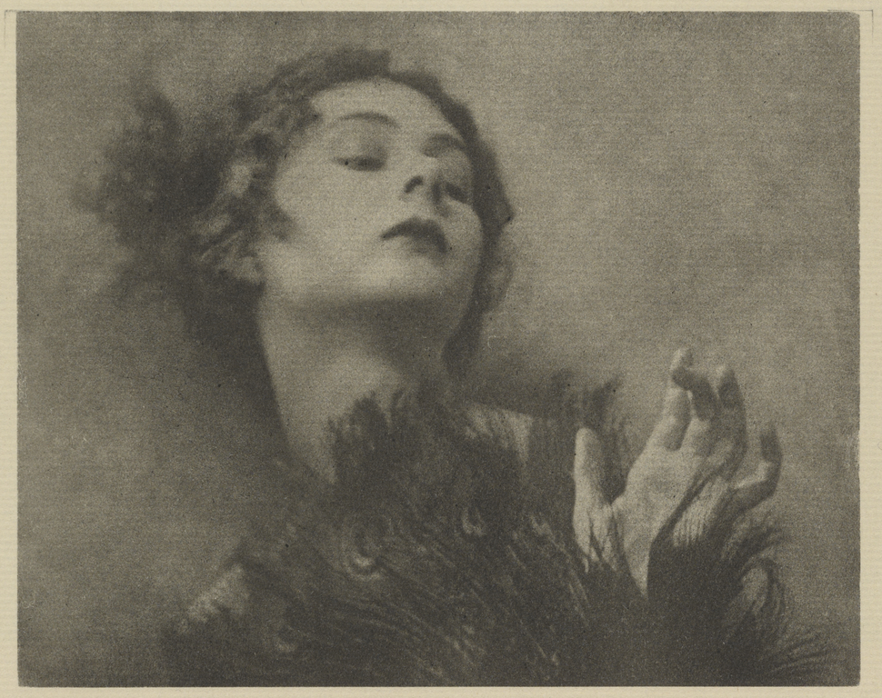 Arthur F. Kales. Woman with Peacock-Feather Fan 1920.  Via getty