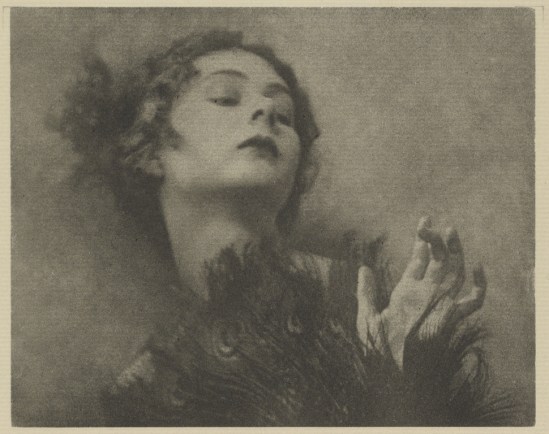 Arthur F. Kales. Woman with Peacock-Feather Fan 1920.  Via getty