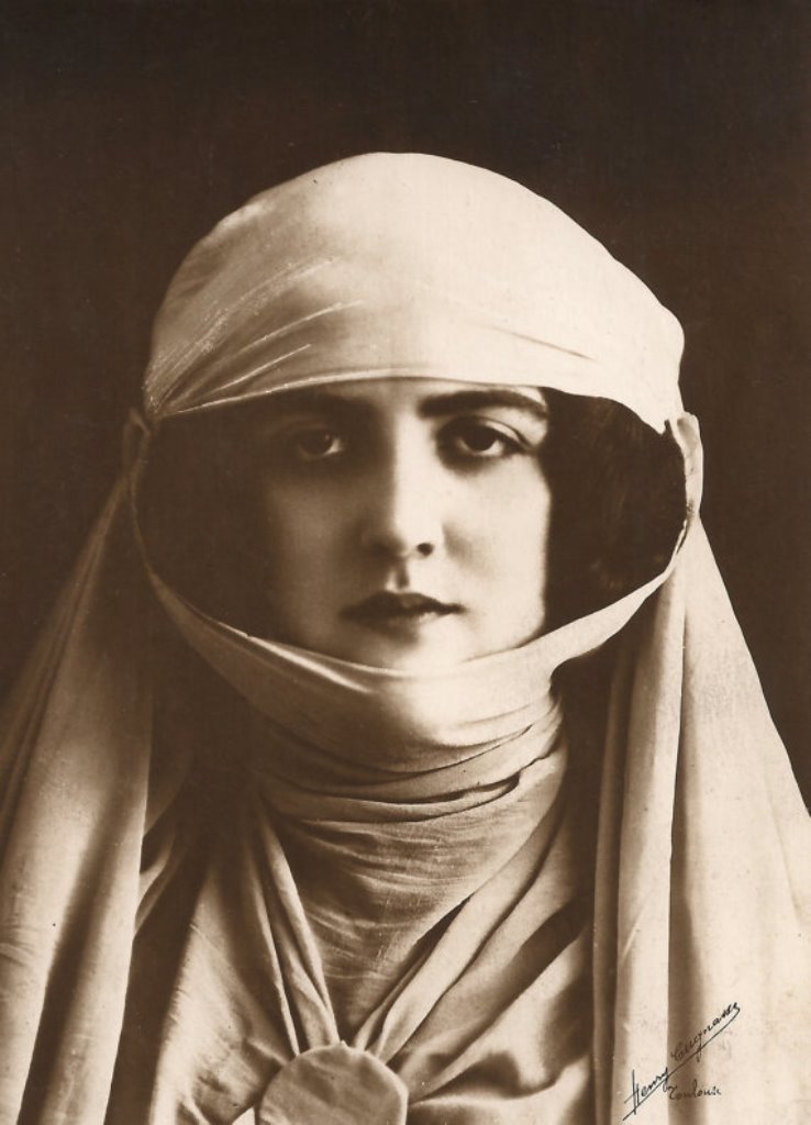 alfred-noyer-mysterious-flapper-woman-in-oriental-harem-costume-1920s-postcard-via-etsy